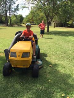 Daniel driving tractor in Oklahoma